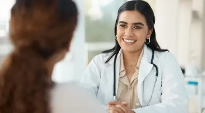 Doctor checking on a patient during a home visit